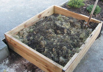 New raised garden bed being preped for early spring planting